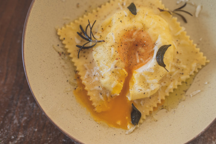 On-Demand : Big Ravioli Cacio and Pepe with Egg Yolk